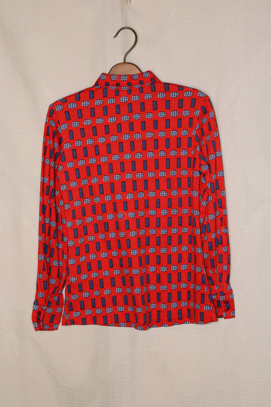 70s red blouse with funky blue pattern