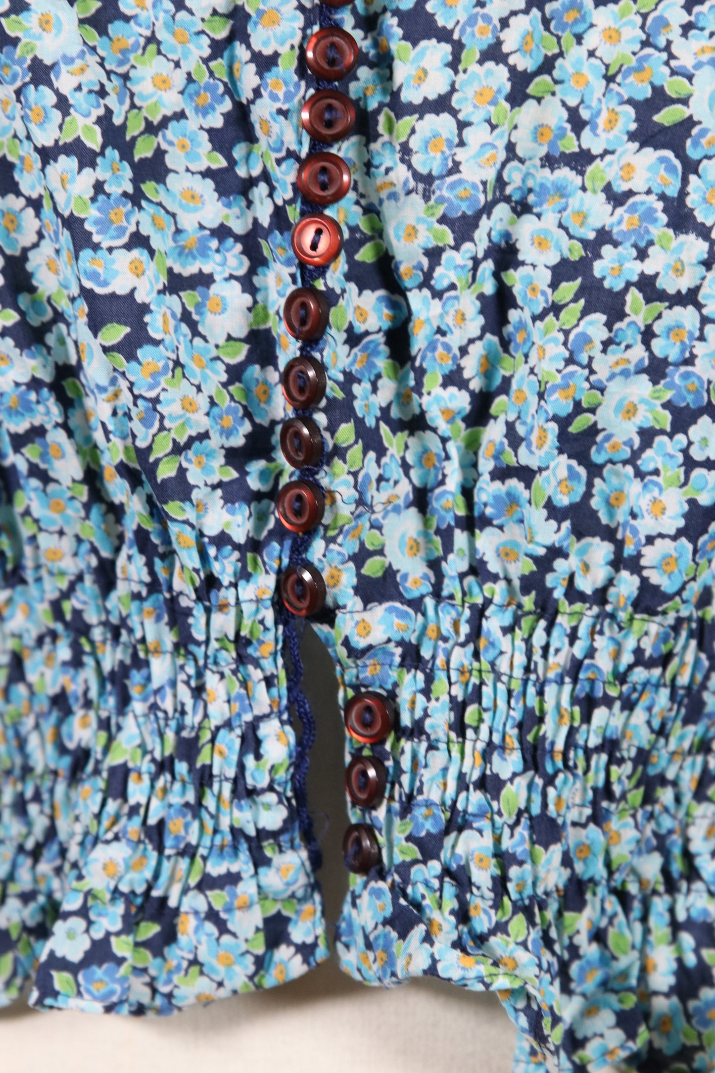 Unique 70s multibutton blouse