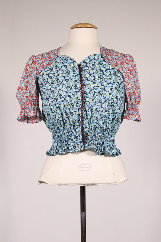 Unique 70s multibutton blouse